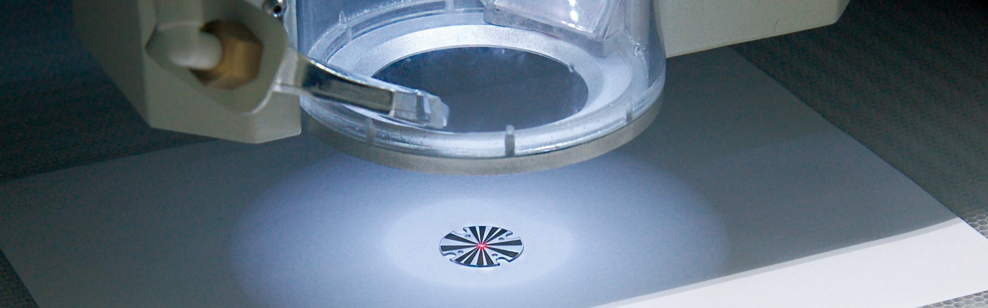 High-precision PCB laser cutting machine processing a circuit board with non-contact laser depaneling technology.